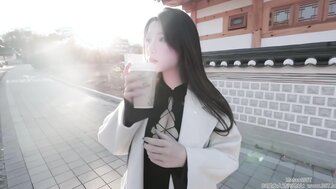 Traveling to South Korea with a busty, fair-skinned beauty.