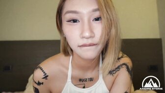A fair-skinned, full-figured Hong Kong woman takes a massive, thick black cock deep in her throat and gets pounded hard in her pussy, looking thoroughly satisfied.